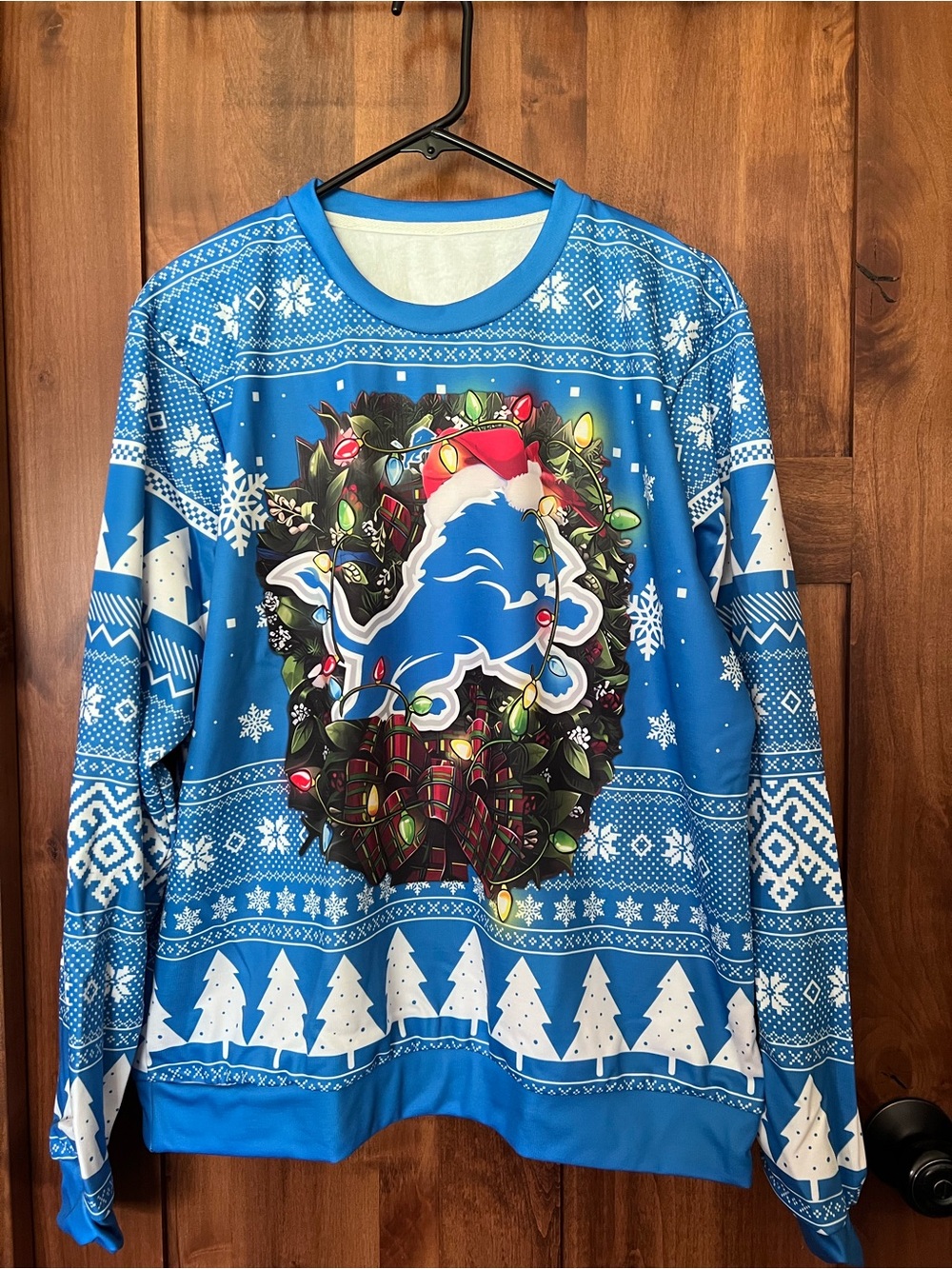 Blue Holiday Crewneck Sweater with Festive Wreath Graphic